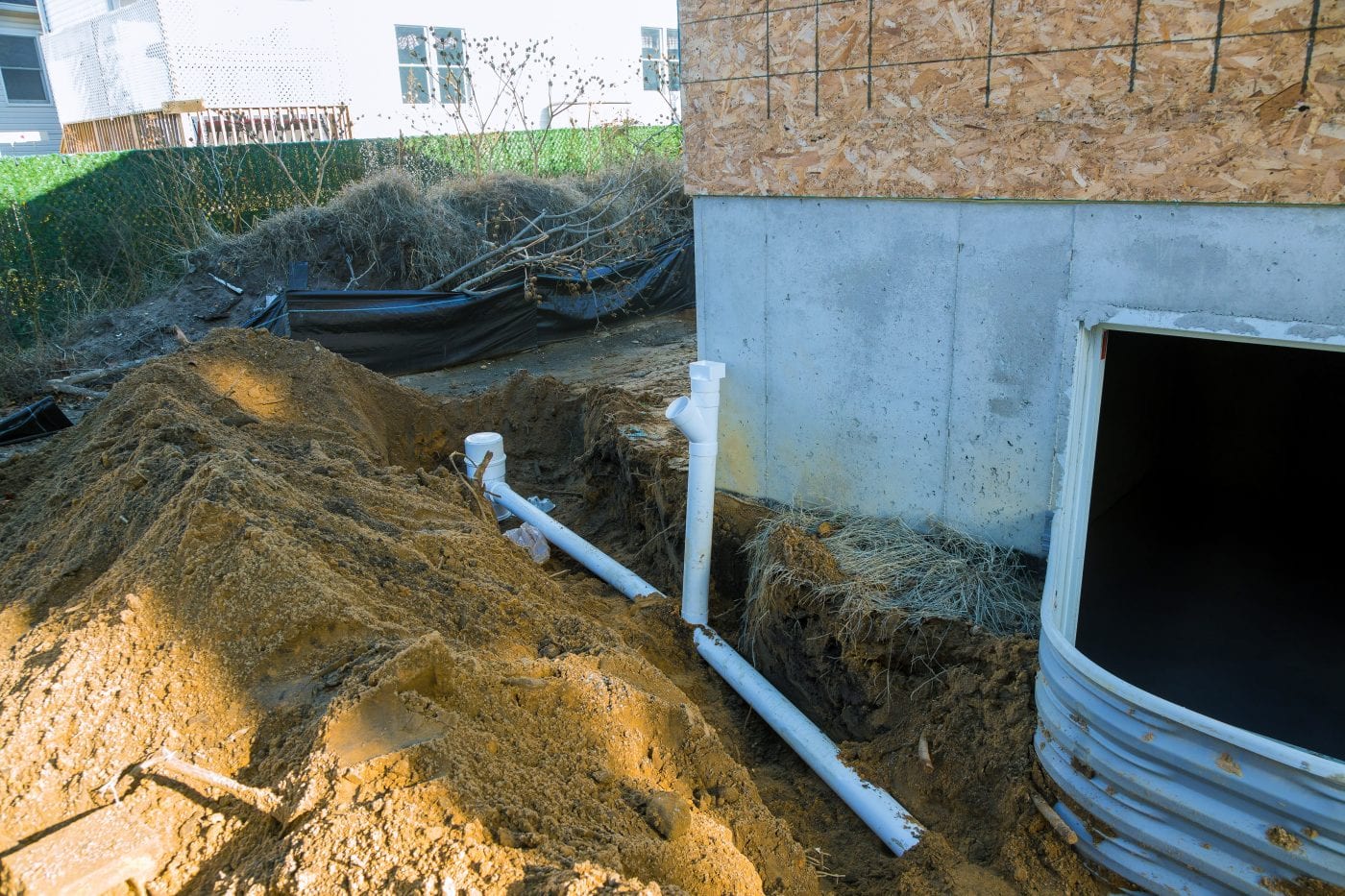 Drainage install around foundation of home